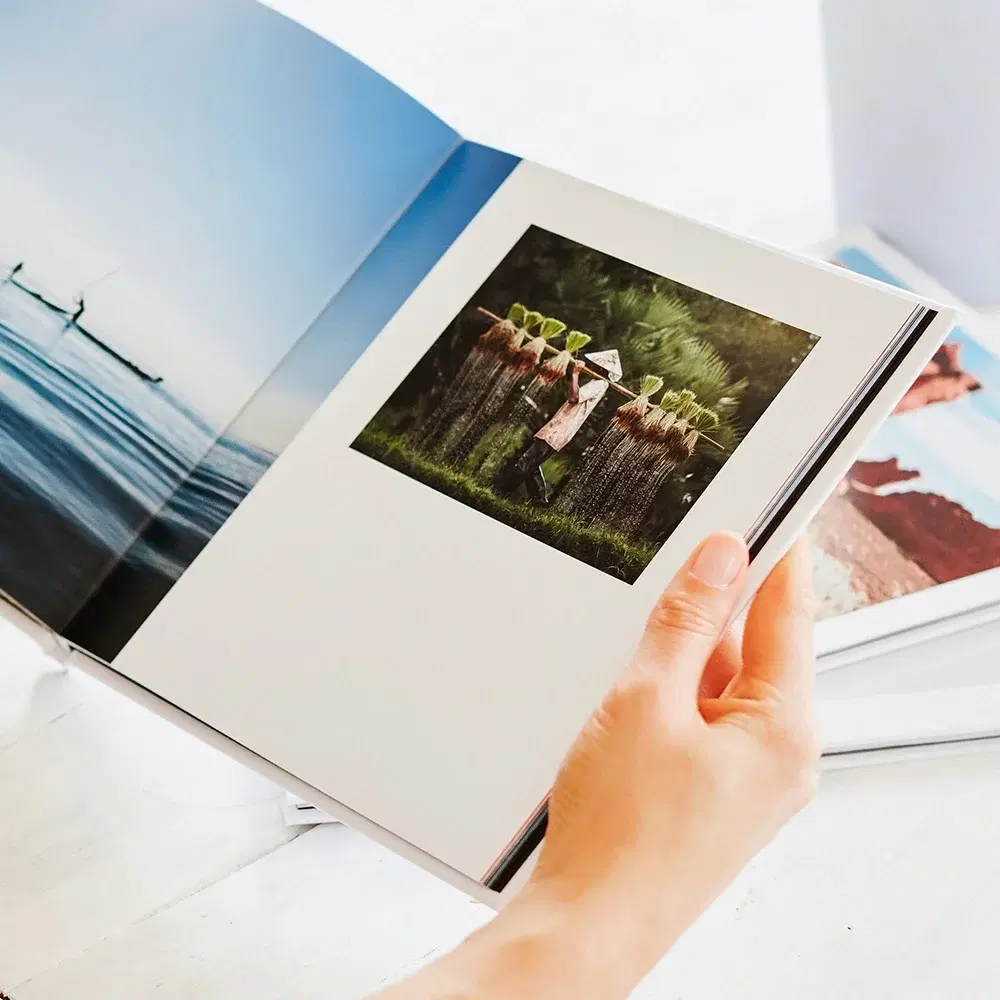 A printed Memoir album, held open to a spread